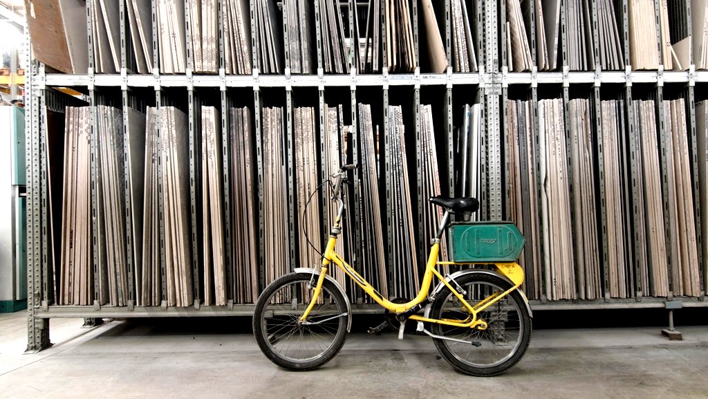 Tile factories so big supervisors needs bikes