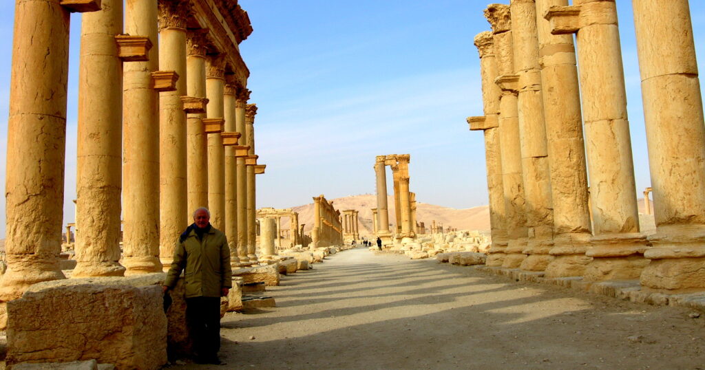 Site of Palmyra (Syrian Arab Republic). One mile of "Main Street" civic buildings including, public baths and temples, some of which were demolished by Islamic State members during their Syrian incursion. Check out our ancestral story of Palmyra warrior queen.